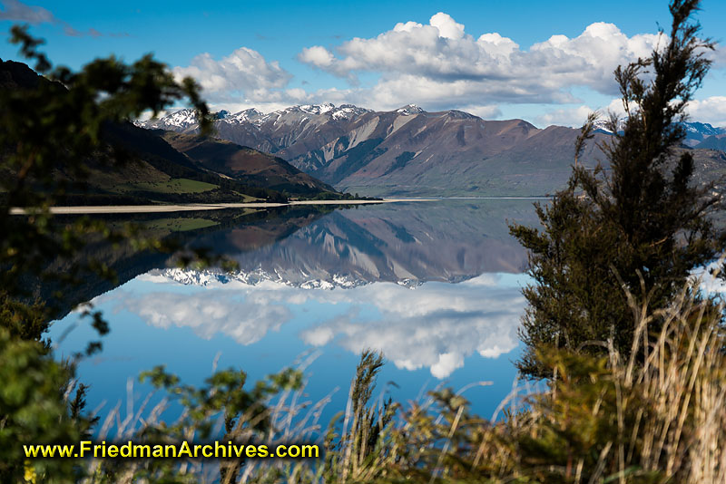 glass,lake,mountain,range,mirror,landscape,water,still,blue,